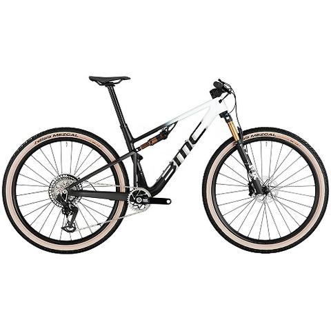 A 2024 BMC Fourstroke 01 LTD Mountain Bike with a sleek black and white frame featuring large wheels and tires designed for off-road cycling.