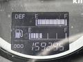 Fuel and DEF gauge display showing fuel level near empty with odometer reading 159295