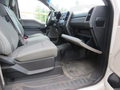 2017 Ford F-250 SD interior view showing front seats and dashboard with grey upholstery and floor mats