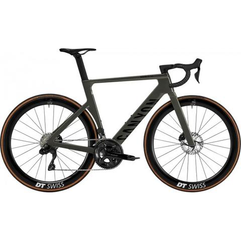 2025 Canyon Aeroad CF SLX 7 Di2 Road Bike with a sleek frame in green featuring drop handlebars and aerodynamic wheels with DT Swiss tires