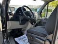 Interior view of a 2017 Mercedes-Benz Sprinter showing the driver's seat steering wheel dashboard and floor mat