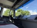 Interior view of a 1994 Volvo FE 42 featuring the driver's seat dashboard and steering wheel with various controls and gauges