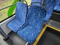 Two blue bus seats with a geometric pattern designed for a 2018 Grande West Vicinity bus