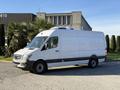 A white 2016 Mercedes-Benz Sprinter van is parked with a smooth exterior and no visible markings on the sides