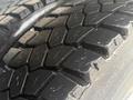 Close-up of a tire tread from a 2016 Freightliner 108SD showcasing deep grooves and textured patterns designed for traction and durability