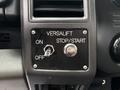 Control panel featuring a Versalift switch with "ON" and "OFF" labels and a "STOP/START" button