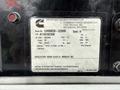 2011 Ford F-650 with a Cummins engine information sticker detailing voltage ratings and specifications