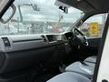 Interior view of a 2009 Toyota Hiace showing the dashboard steering wheel and seats