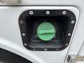 Close-up of a 2018 Ford F-550 diesel fuel cap with a green label indicating fuel type and instructions for use