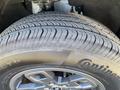 Close-up of a tire mounted on a 2023 Ford Bronco Sport featuring a Continental brand and a detailed tread pattern
