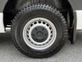 A 2019 Mercedes-Benz Sprinter tire featuring a black Kumho Road Venture tread pattern with a silver wheel rim