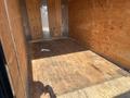 A 2020 Mirage Enterprises 12 Foot Cargo trailer featuring wooden walls and flooring empty of any visible items