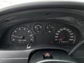 The dashboard of a 2010 Ford Ranger displaying various gauges including speedometer tachometer fuel and temperature indicators