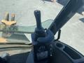 The control joystick of a 2008 Case Super 580M construction vehicle