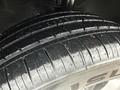 Close-up view of a tire from a 2016 Mercedes-Benz GLA-250 showing tread pattern and texture