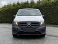 Front view of a 2023 Mercedes-Benz Metris with its iconic logo and headlights illuminated