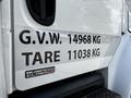 A white 2012 Freightliner M2 106 truck displaying weight specifications for G.V.W. 14968 KG and TARE 11038 KG on its side panel