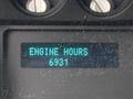 Display panel showing engine hours reading 6931 on a dashboard of a 2012 Ford F-450 SD