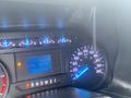 A close-up of the dashboard of a 2017 Ford F-550 featuring a speedometer fuel gauge and digital display showing distance and mileage