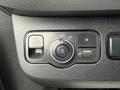 Control panel of a 2019 Mercedes-Benz Sprinter featuring buttons and a dial for parking lights fog lights and headlight settings