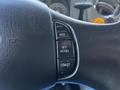 Steering wheel of a 2011 Ford F-750 featuring cruise control buttons labeled RES SET ACCEL and COAST