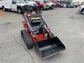 A 2024 AGT Industrial LRT23 compact loader with a black bucket at the front and tracks for movement