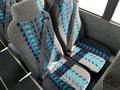 Interior seats of a 2022 Blue Bird BB Conventional bus featuring blue and gray upholstery with patterned design and seatbelts