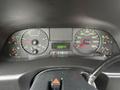 Dashboard of a 2006 Ford F-450 displaying gauges for RPM speed and fuel with an odometer reading 280077 kilometers