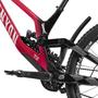 2025 Canyon Sender CFR Mullet Mountain Bike featuring a sleek frame with a striking red and black color scheme and advanced suspension components designed for high performance on rugged terrain
