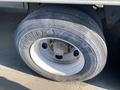 A Goodyear tire mounted on a wheel of a 2023 Wabash International truck