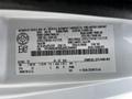 A 2018 Ford Econoline vehicle identification label detailing specifications and manufacturing information