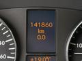 The dashboard display of a 2012 Mercedes-Benz Sprinter showing a mileage of 141860 km and a temperature reading of 18 degrees Celsius
