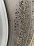 Close-up of a tire on a 2014 RAM 5500 showing tread and embossed text with specifications and safety warnings