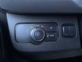Control panel for lighting in a 2019 Mercedes-Benz Sprinter featuring dials and buttons for automatic lights and fog lights