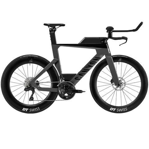 2025 Canyon Speedmax CF 7 Di2 Road Bike featuring a sleek aerodynamic frame integrated hydration system and high-profile wheels for optimal performance
