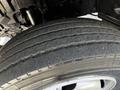 Close-up of a tire from a 2018 Hino 195 showing tread pattern and sidewall details