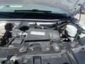 2007 Chevrolet Express engine compartment showing the Vortec engine with various components and wiring visible