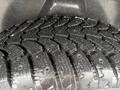 Close-up of a rugged tire tread from a 2019 RAM 1500 Classic showcasing deep grooves and an aggressive pattern designed for traction and durability