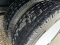 Close-up of dual tires on a 2012 International TerraStar showing detailed tread patterns and surface texture