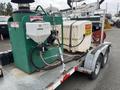 A 2011 Hightliner Aquacide Hot Water Weed Control Dual Flat Deck Trailer featuring a large tank and a pump system for weed control applications