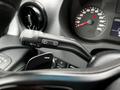 A close-up of the control stalk on a 2019 Mercedes-Benz Sprinter showing buttons for wipers and indicators
