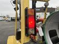 A red warning light on a 2000 Hyster 120 forklift mounted on the side of the vehicle