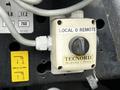 A control switch labeled "LOCAL 0 REMOTE" with a black knob and a label that reads "TECNORD Modena - Italy" mounted on a panel next to other controls and indicators