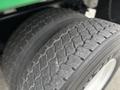 Close-up of a 2015 Freightliner M2 106 tire showing its tread pattern and wear level