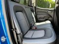 The backseat of a 2021 Chevrolet Colorado featuring two upholstered seats with a combination of dark and light fabric designs