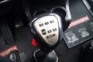 The gear shift of a 2015 Kenworth T660 featuring a numeric display for gear selection including low and high range options