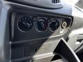 Dashboard controls of a 2015 Ford Transit featuring knobs for temperature air conditioning and a USB port