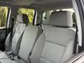 Interior of a 2018 Chevrolet Silverado 1500 showing front seats with gray upholstery and seatbelts