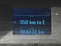 Digital display showing remaining distance of 350 km to empty and total distance of 068131 km in a 2018 Ford F-550