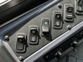 Control panel of a 2022 Blue Bird BB Conventional featuring various switches for fan speed and heater pump settings